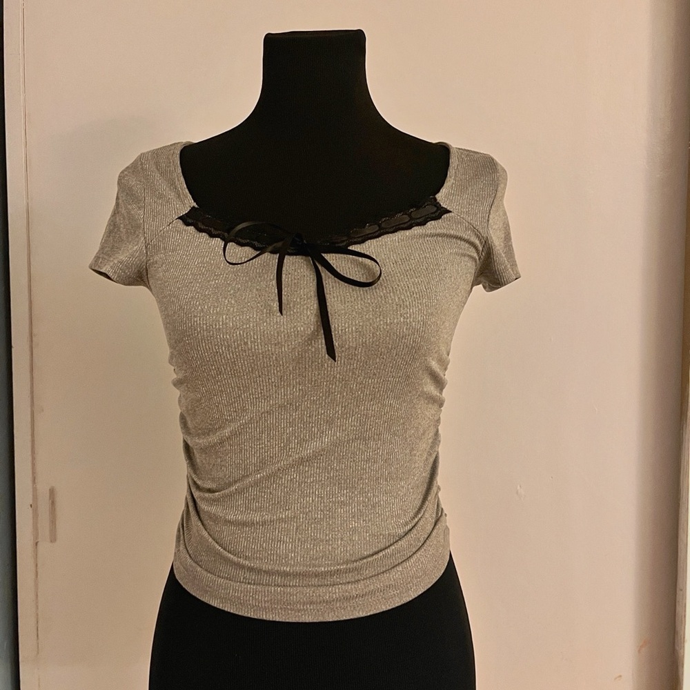 Elegant Cream Top with Black Lace Detail